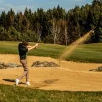 Hitting the ball at Otočec golf course